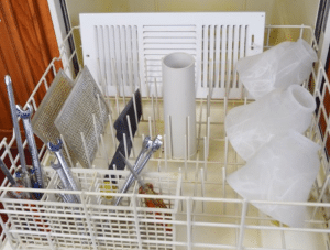 Apartments for rent in Spring TX A dishwasher filled with cleaning supplies in apartments for rent in Spring TX.