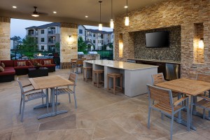 Apartment rentals in Tomball, TX - Covered Outdoor Patio with Seating Areas and TV