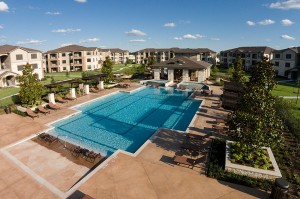 Apartments in Tomball, TX - Elevated View of Pool and Patio Area